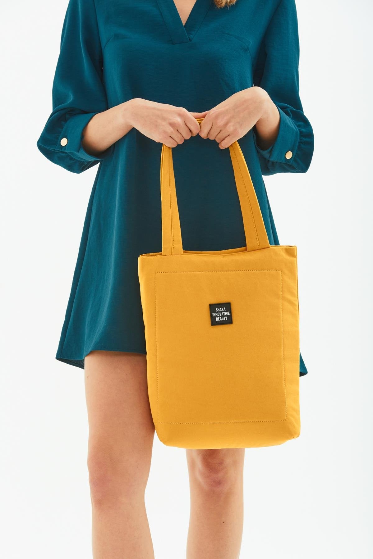 Mustard I 3-Compartment Canvas Tote Bag With Snap Closure Back 2 Pockets Detail