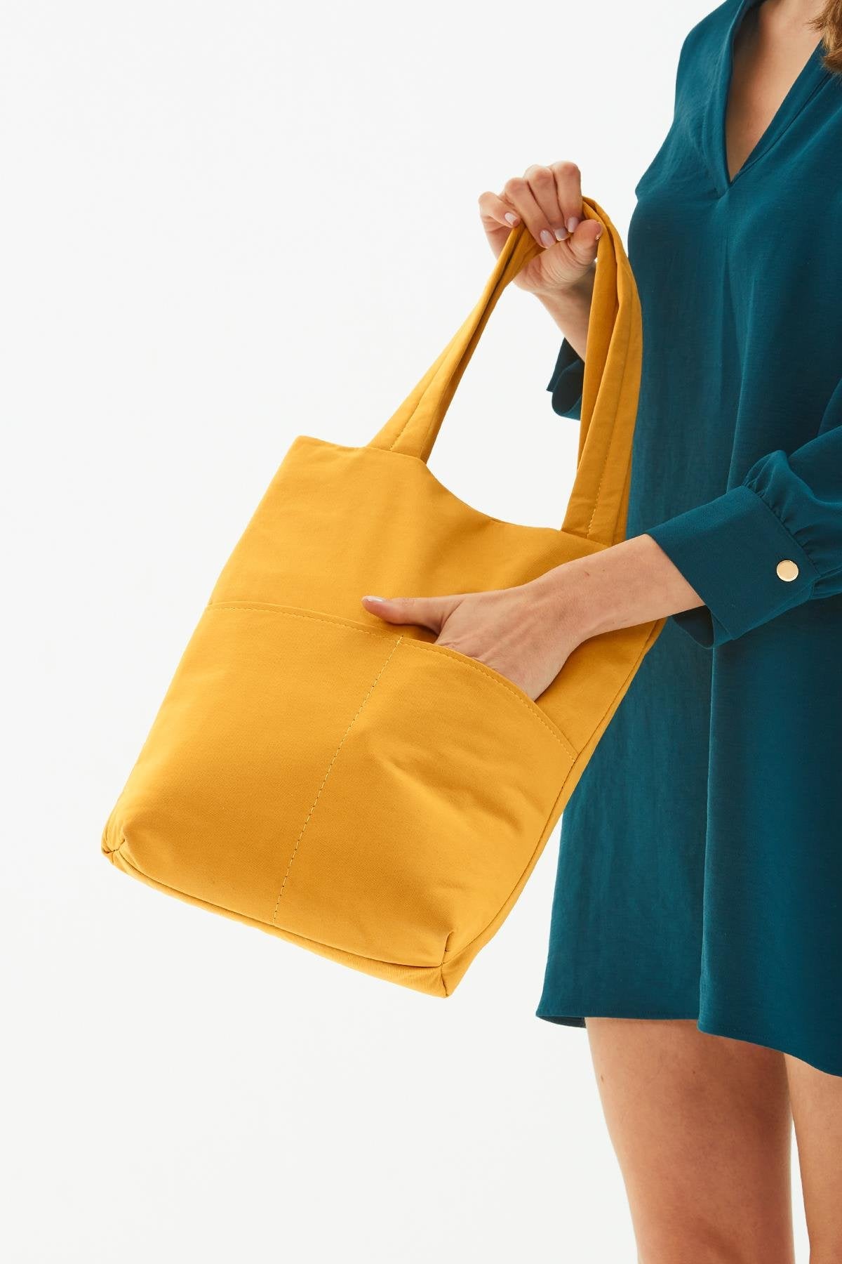 Mustard I 3-Compartment Canvas Tote Bag With Snap Closure Back 2 Pockets Detail