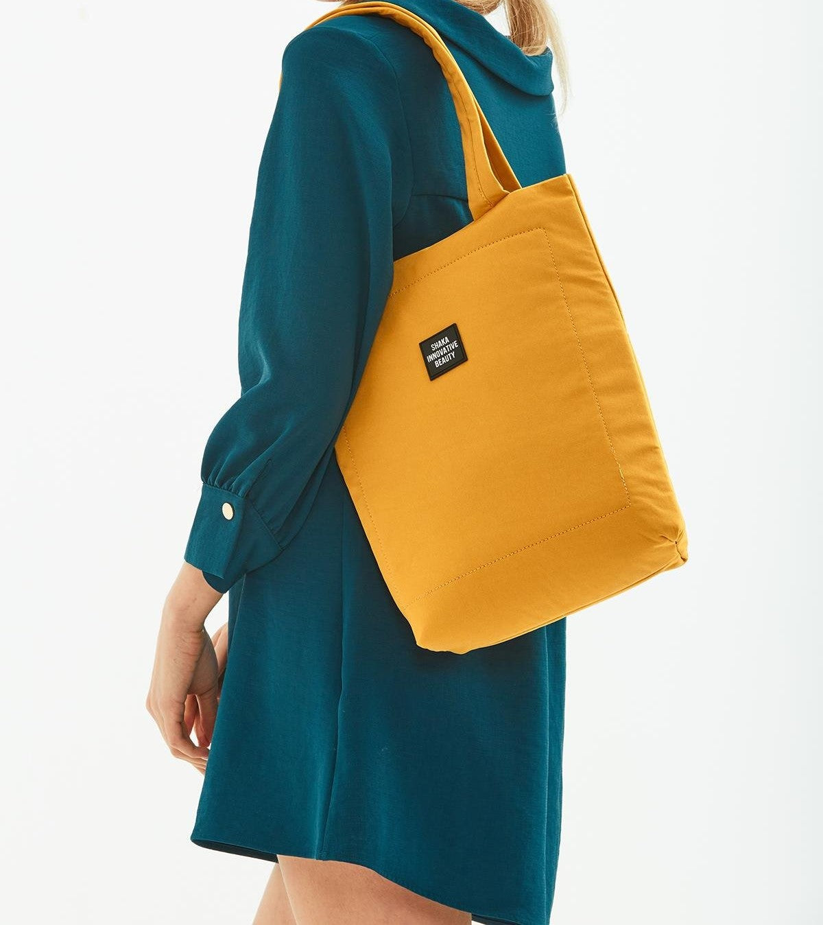 Mustard I 3-Compartment Canvas Tote Bag With Snap Closure Back 2 Pockets Detail